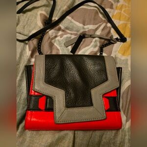 VINCE CAMUTO Stylish Black and Hot Pink Women's Crossbody Bag. EUC